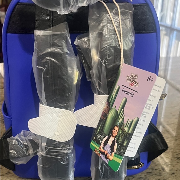 Loungefly Oz Adventure Backpack - Blue and Yellow - Picture 2 of 2